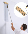 9 Inch Paint Roller Kit with Heavy Duty Stainless Steel Frame and Ultra Thick Nap for Ceilings and Walls Lazy Diy Hack in use, painting a wall.