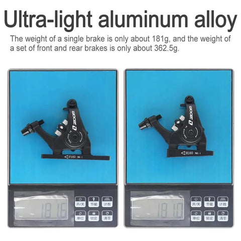 Rock Solid Mechanical Disc Brakes For Road And Cyclocross Bikes Flat Mount Caliper shown on scale weighing 181.6g and 181.0g.