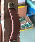 Leather Drawer Pulls With Iron Plate For Enhanced Bearing Capacity 6 Piece Set on wooden surface, close-up view
