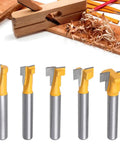 Five Piece T Slot Router Bit Set For T Track Grooving With Tough Carbide Cutters That Drop Dead Smooth Cuts On Plywood Mdf And Hardwood For Zero Stress Bolt Setup In Any Workbench Shop, displayed on wood.