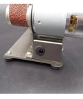 Compact Mini Electric Belt Sander And Multifunctional Desktop Grinder Workhorse For Diy Woodworkers showing metal base, motor, and sanding belt.