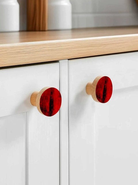 Top Shelf 2 Piece Cabinet Knobs Measuring 1.6 Inch Tall Featuring A Dope Red Matte Finish Crafted From Solid Beech Wood With A Sweet Abstract Graphic Pattern Offering Hella Sturdy Performance For Modern Kitchen Hardware on white kitchen cabinets.