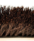 Close-up of bristles on Heavy Duty 18 Inch Palmyra Bristle Push Broom For Garage Indoor Floor Sweep Top Shelf Wooden Block.