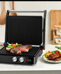 Heavy Duty 1000W Electric Panini Press Grill With Non Stick Plates Opens 180 Degrees For Any Size Food 3 in 1 Sandwich Maker Stainless Steel Surface Removable Drip Tray Fast Heating Indoor Grill with steak and vegetables.