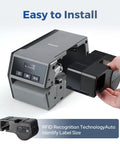 Rugged Industrial Label Printer With 2 Inch Print Head, Plug And Play Phone And Pc Sync, Beefy 2600 Mah Battery, Straight Up Job Site Workhorse For Cables, Assets, Electrical And Warehouse Markings showing label cartridge insertion.