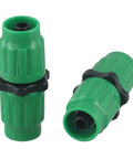 Grab This Expandable Garden Hose Repair Kit For All Your Leaks And Fittings, Featuring Tough Plastic Connectors That Fix 25 50 75 Or 100 Foot Hoses Perfectly With A Solid Build To Stop Drips And Restore Flow In No Time. Green plastic hose repair connectors with black rings shown from two angles.