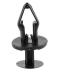 Close-up of GM fender liner clip, 20mm black thermoplastic push fastener for securing Buick Enclave and Cadillac Escalade trim panel.
