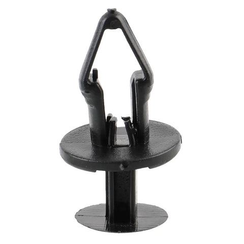Close-up of GM fender liner clip, 20mm black thermoplastic push fastener for securing Buick Enclave and Cadillac Escalade trim panel.