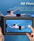 Rugged Waterproof Phone Pouch With Clear Touchscreen Window showing underwater photo capture with device during swimming.