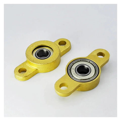 Thinking Process:. 5mm yellow metal pillow block bearing unit with two mounting holes for industrial shaft support