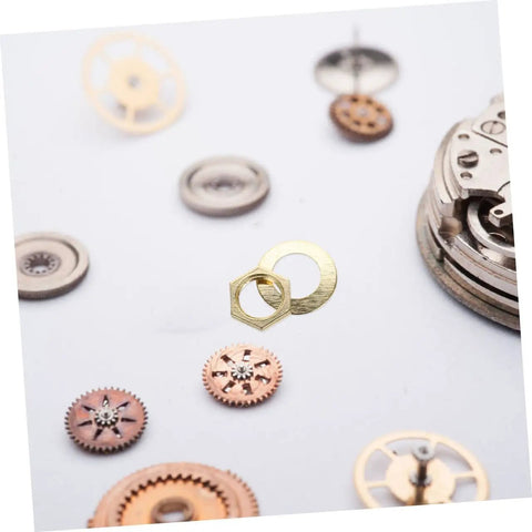 Close-up of clock gears with golden metal components from Clock Movement Nut Set With Washers 14 Pcs Replacement Parts Kit.