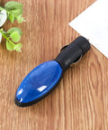 Universal Car Fuel Saver Device With Plug And Play Energy Economy Boost Improves Start And Power Helps Save Ten To Thirty Percent On Gas Instantly Compatible With Cars Trucks And Diesel Engines Easy Install, shown close-up on wooden surface.