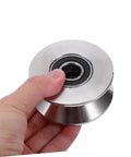 Heavy Duty Stainless Steel U Groove Sliding Door Roller Pulley With Ball Bearings held in hand, designed for seamless sliding on tracks.