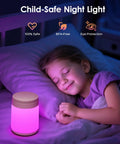 Child sleeping next to Colorful Baby Night Light For Nursery And Kids Room With 10 Colors And 8 Dimmable Levels, pink glow.