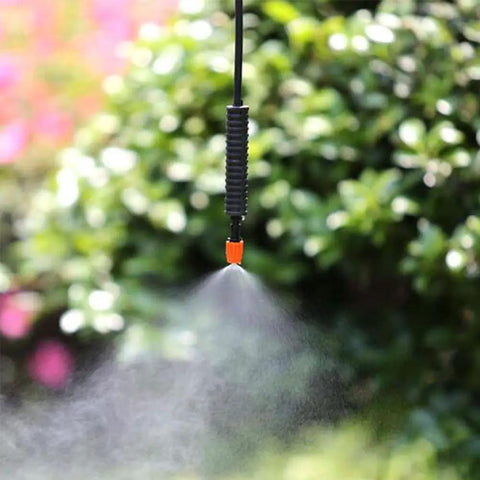 Close-up of 50 Piece Garden Micro Flow Drippers Sprinklers Emitter Set With Adjustable Drip Heads For Watering Systems misting water