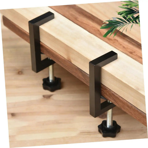Rattan Furniture Clamp 2 Pack For Patio And Sectional Sofas, shown securing wooden slat in place, outdoor setup.