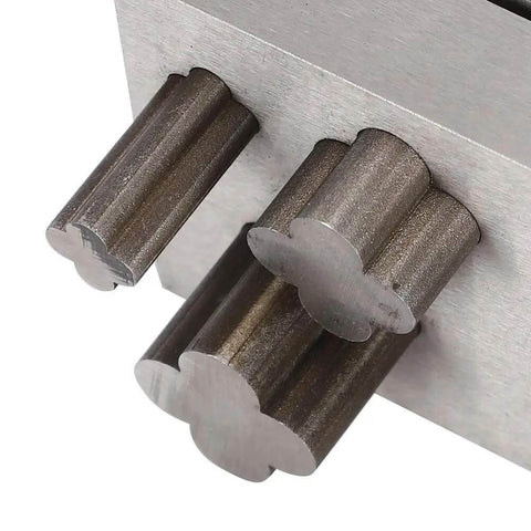 Close-up of Pro Grade Disc Cutter Set for Jewelry Making with Clover Punches showing multi size earring die punch tool for metal cutting.