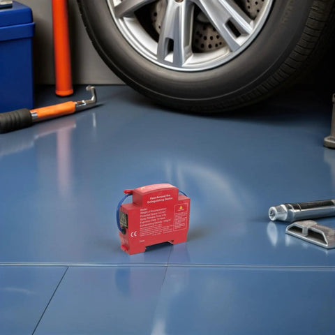 Slick Automatic Aerosol Fire Extinguisher With Smart Sensor Detection on garage floor, compact design fits cars and trucks.