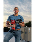 Man holding RP 350 ProPress Pressing Tool And Battery Kit With 18 Volt Battery And Charger For Pro Plumbers And HVAC Pros