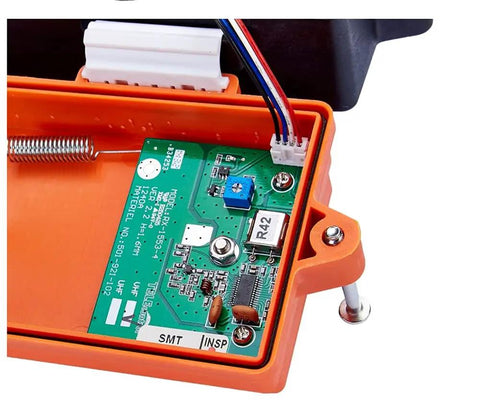 Open casing of Heavy Duty Wireless Crane Remote Control System with inner circuit board and wiring detail.