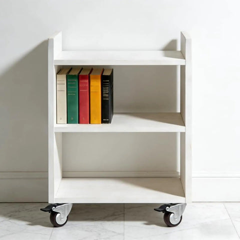 Dead Silent TPR Rubber Swivel Casters With Parking Brake Lock support a white bookshelf with books, ideal for easy movement.
