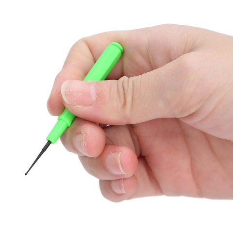 Close-up of hand holding oiler pen from Dope Pro Grade Watch Repair Kit With Stainless Steel Tools Lubricant Oiler Pens Static Tweezers