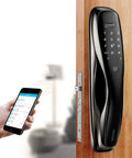 Game Changing Smart Door Lock With Biometric Fingerprint App Control Keyless Entry Security Electronic Lock on wooden door with smartphone.