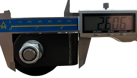 Close-up measuring Beefy 12 Inch Sliding Gate Guide Roller With Removable Axle Bolts Black Hard Rubber Wheel Weld On Mount Heavy Duty Steel Bracket 12 Inch Long 2.375 Inch Wide Wheel 4.5 Lb Each Gate Accessory.
