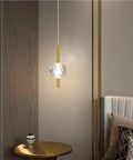 Nordic Minimalist Pendant Light With Crystal Glass Shade, Adjustable Mini Ball Design, in modern bedroom setting