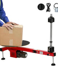 Heavy Duty Electric Pallet Wrap Machine And Stretch Film Dispenser That Makes Loading A Breeze For Warehouses And Freight Centers Up To Eighty Kilograms And Built Tough Rust Resistant Frame with a box being placed on it.