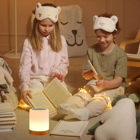 Children reading next to Night Light Touch Sensor Lamp For Kids Bedroom And Nightstand Rechargeable Dimmable Warm White