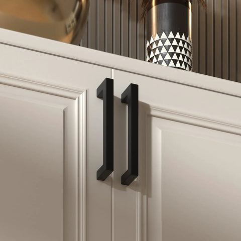 Close-up of two black stainless steel square bar cabinet handles on white cabinet, part of 15 Pack Black Drawer Pulls Square Bar Cabinet Handles for Kitchen and Bathroom Cabinets Center to Center 10 Inch Stainless Steel Sleek Modern Hardware for Dresser Drawers