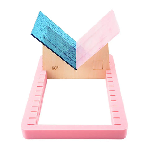 Heavy Duty Stained Glass Angle Jig With Smooth Sliding Bracket And Six Solid Boards For Hassle Free 3D Prism Building And Dead On Copper Foil Soldering Alignment Crafters Really Dig This, featuring blue and pink glass pieces on a wooden frame.
