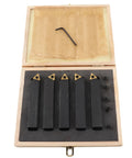 Front view of a 5-piece carbide turning tool set with indexable inserts in a wooden case; hex key included
