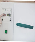 Heavy Duty Oven Handle Replacement For Commercial Kitchen Equipment on an oven, with a green ergonomic grip and display panel.