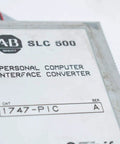 Close-up of 1747-PIC Interface Converter 24 V DC Personal Computer Interface Card for PLC Systems, SLC 500 label visible.