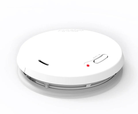 PRC710 Smoke And Carbon Monoxide Alarm With Built In 10 Year Battery For Real World Home Safety Electrochemical CO Sensor And Photoelectric Smoke Sensor For Quick Reliable Detections White device, close-up angle, showing slim profile.