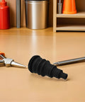 Rugged Rubber Grommet Kit For Automotive Wiring Harnesses And Wire Bundles Fits Three Eighths To One Inch Wires Durable Black Seals For DIY Install And Vehicle Cabling That Works Like A Charm, black rubber grommet on workbench