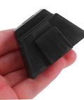 Close-up of a black plastic piece from the 12 Piece Modular Wrench Organizer Tray For Garage And Workshop Space Saving Tool Holder