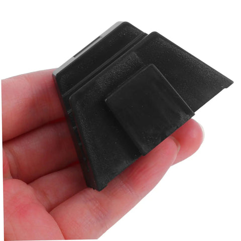 Close-up of a black plastic piece from the 12 Piece Modular Wrench Organizer Tray For Garage And Workshop Space Saving Tool Holder
