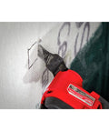 Heavy Duty Carbide Tipped Metal Cutting Blades With Ultra Sharp Edges cutting into drywall with a power tool.