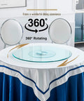 Heavy Duty 43 Inch Lazy Susan Turntable Smooth 360 Rotating Tempered Glass Dining Table Serving Tray on a blue and white tablecloth.