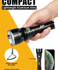 Person holding black flashlight, showcasing compact size; Yellow Underwater Dive Light For Scuba And Spearfishing With Beast Bright 3000 Lumen Waterproof Flashlight, 150m Depth, 400m Long Range, Perfect For Night Dives, Murky Water, Caving, Spearfishing, And Hunting