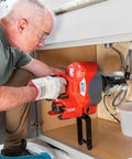 Heavy Duty Cordless Drain Snake With Brushless Motor and Twenty Five Foot Steel Cable Blasts Away Stubborn Clogs fast under sink use.
