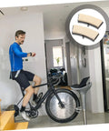 Person using stationary bike at home with inset showing Universal Indoor Bike Brake Pads For Stationary Cycles.