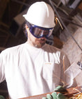 Worker wearing Odyssey II Eye Protection Goggles For Work Anti Fog Scratch Resistant Latex Free Shield With Dual Panel Clear Lenses