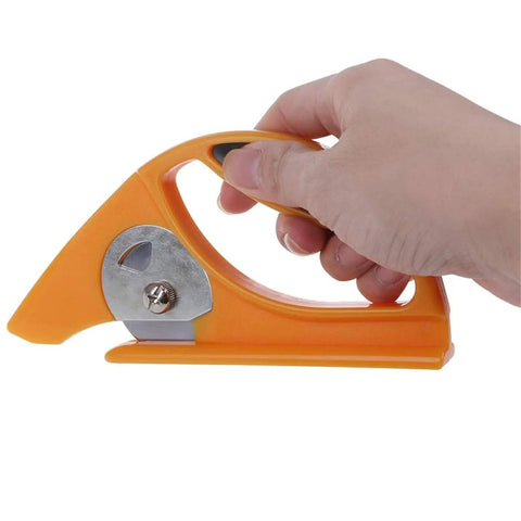 Hand holding Cordless Carpet Cutter Tool Pro Grade For Fast Precise Cutting Of Carpet And Aluminum Materials, orange handle visible