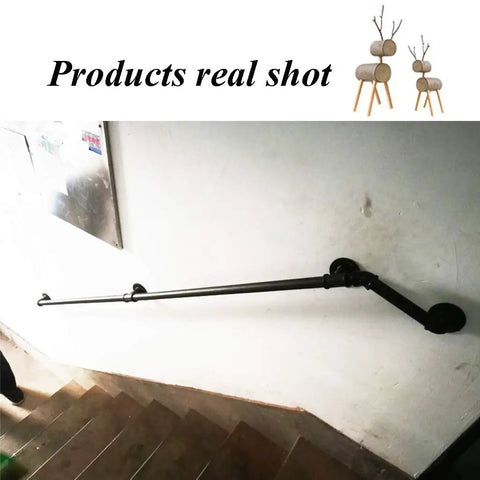 Rock Solid Industrial Pipe Handrail Stair Banister Wall Mount Anti Slip Grip Tube Custom Cut Up To Twenty Feet slick black handrail mounted on wall by stairs.