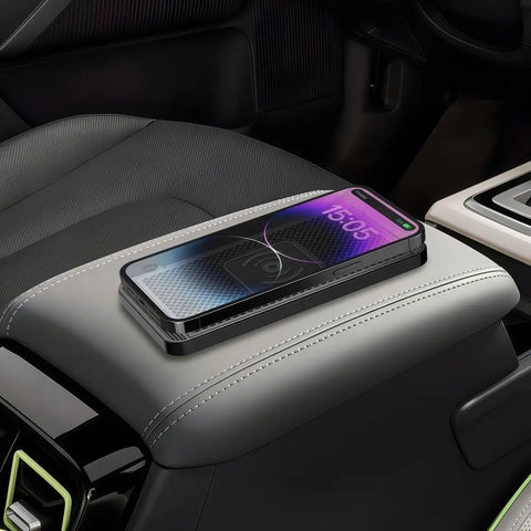 Hella Fast 15W Wireless Car Charging Pad For Chevrolet Blazer EV 2023 Through 2025 with a smartphone charging on a center console.