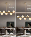 Groovy Mid Century Modern Pendant Light Set Featuring Sleek Glass Globes and Gold Finish adjustable height display in dining room.